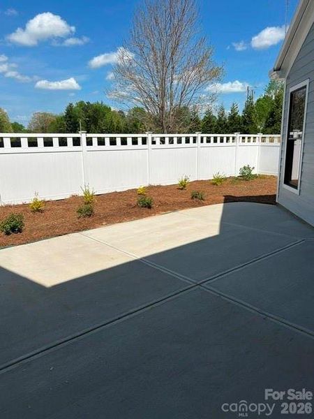 Exterior details and patio area of a home in The Courtyards at Hodges Farm, Charlotte (Image 4).