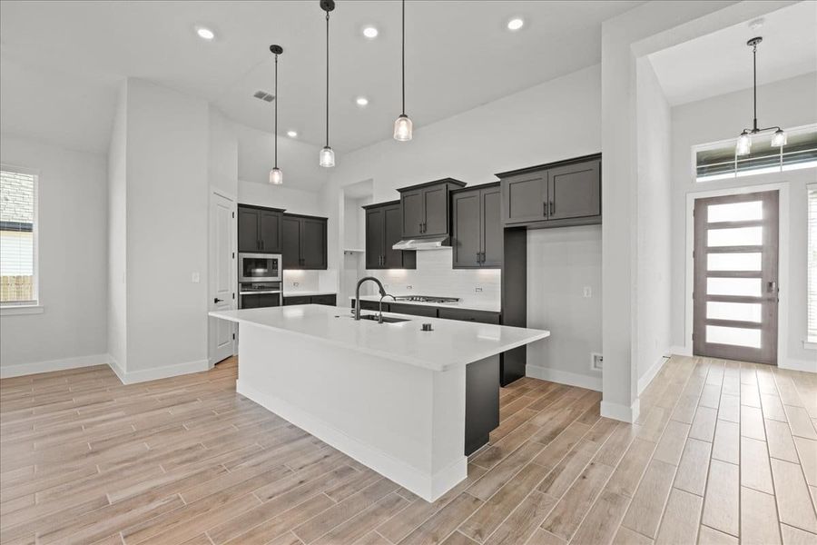 Furnished interior view inside a new home in Village at Three Oaks, Seguin (Image 10). Furnished interior view inside a new home in Village at Three Oaks, Seguin (Image 10).