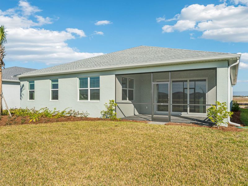 Exterior details and patio area of a home in Crescent Lakes - Signature Series, Punta Gorda (Image 4).