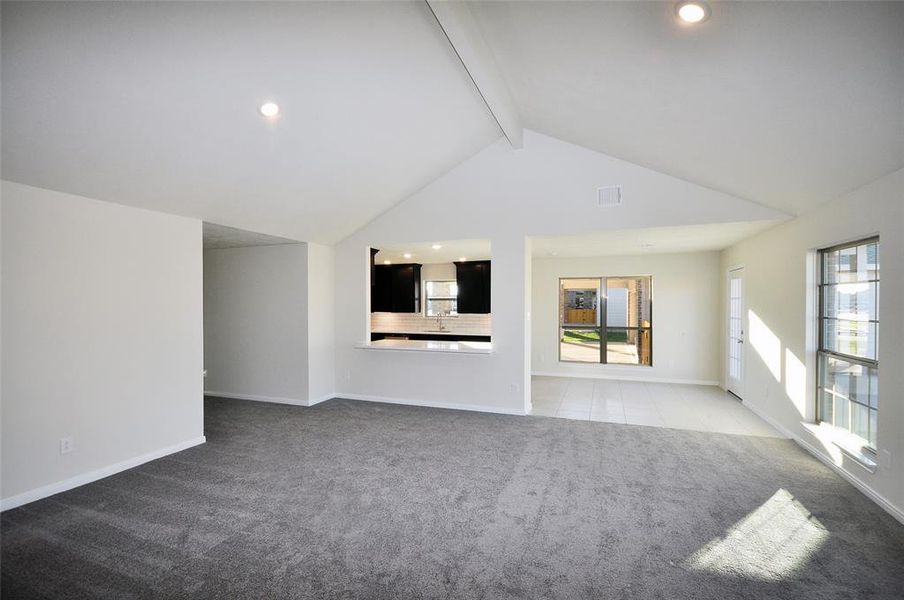 View back to the kitchen from the family room