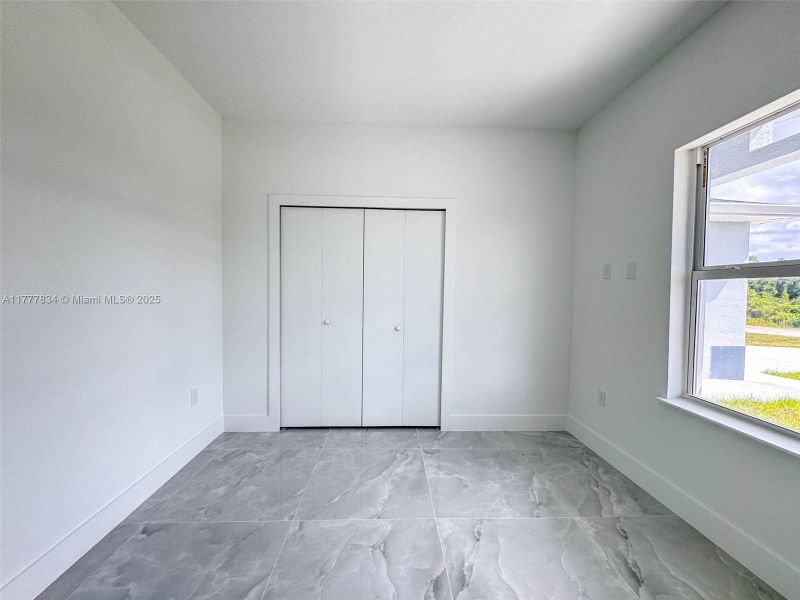 Spacious, unfurnished interior of a new home in , Lehigh Acres (Image 14). Spacious, unfurnished interior of a new home in , Lehigh Acres (Image 14).