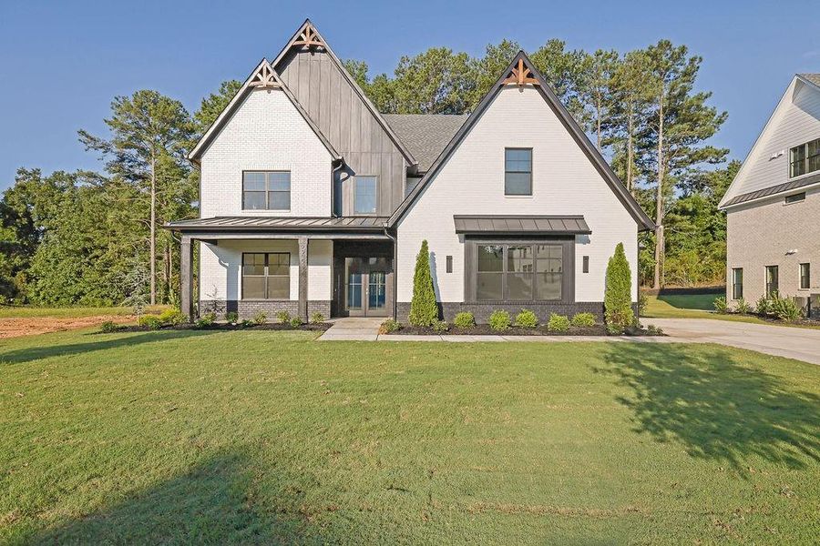 Front exterior of a new home in , Cumming, GA, highlighting curb appeal (Image 24).