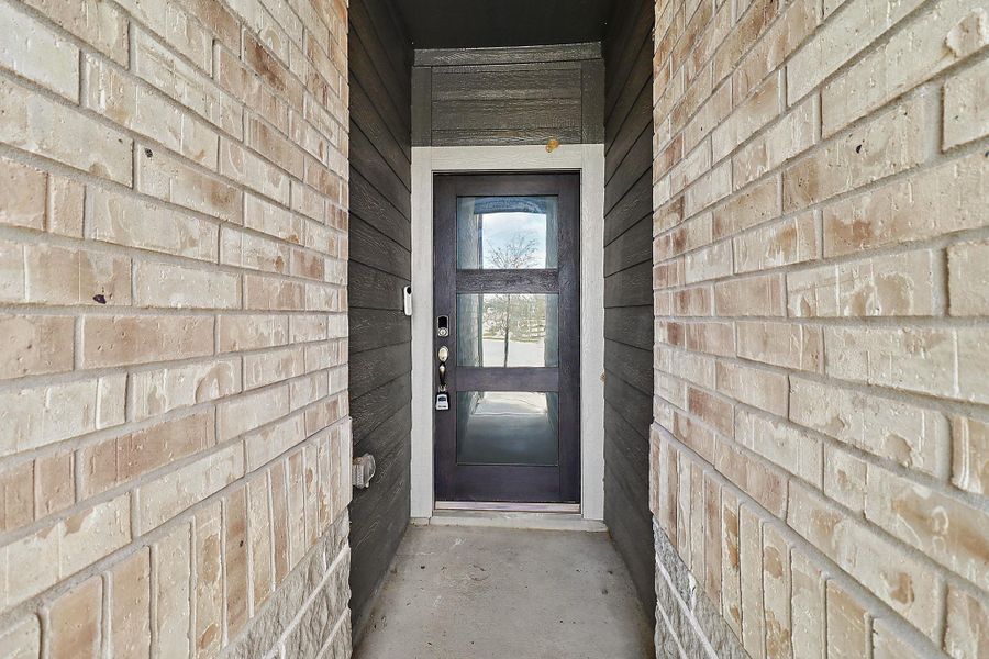 Exterior details and patio area of a home in Heights of Barbers Hill, Baytown (Image 3).