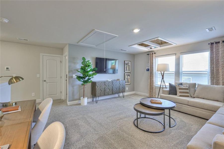 Furnished interior view inside a new home in Martin Springs - Estate Series, Lawrenceville (Image 11).