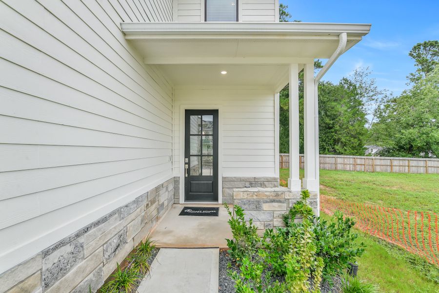 Exterior details and patio area of a home in Summer Place  35', Montgomery (Image 30).