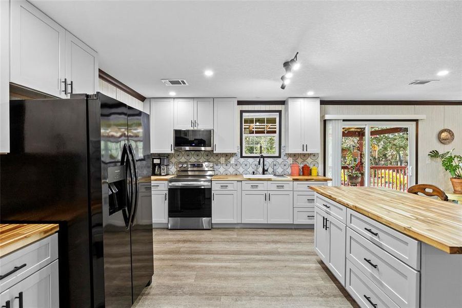 Furnished interior view inside a new home in , Okeechobee (Image 29).