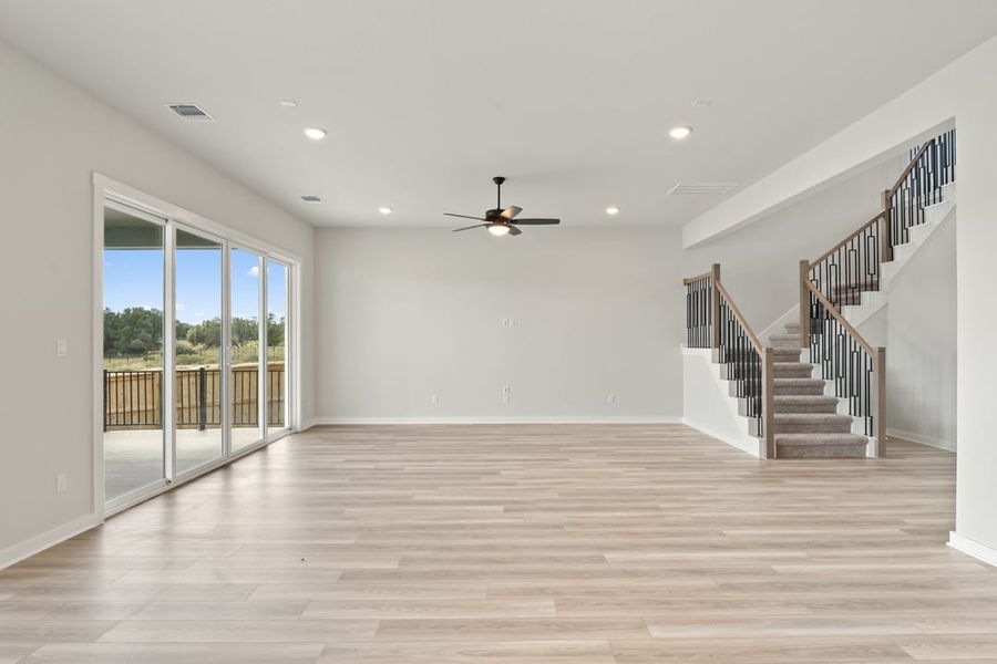 Spacious, unfurnished interior of a new home in Capitol Collection at Lariat, Liberty Hill (Image 24).