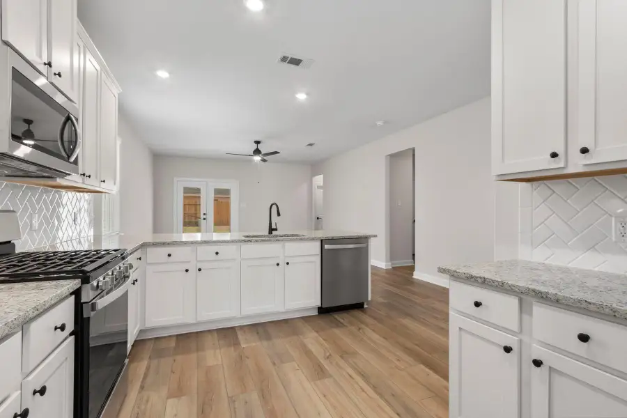 Furnished interior view inside a new home in Emberly, Beasley (Image 5).