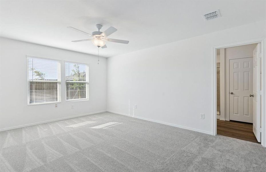 Spacious owner's suite with large windows Spacious owner's suite with large windows