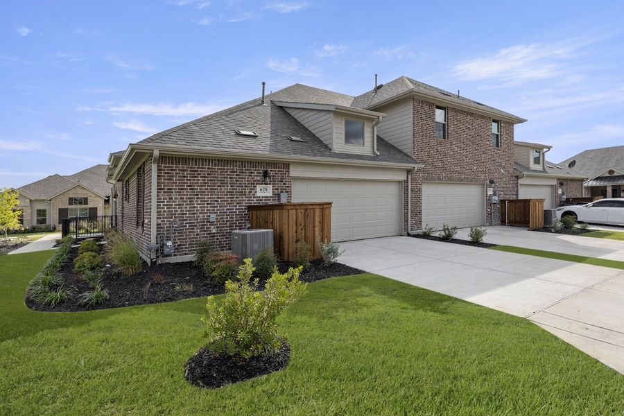 Front exterior of a new home in Woodbridge Villas, Wylie, TX, highlighting curb appeal (Image 20). Front exterior of a new home in Woodbridge Villas, Wylie, TX, highlighting curb appeal (Image 20).