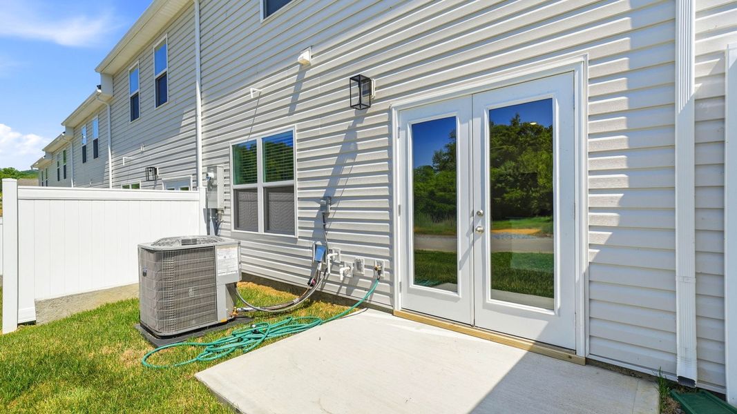 Exterior details and patio area of a home in The Arbor Townhomes, Kingsport (Image 4).