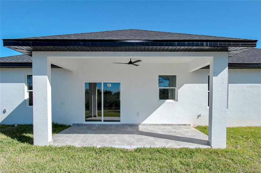 Exterior details and patio area of a home in , Sebring (Image 29).