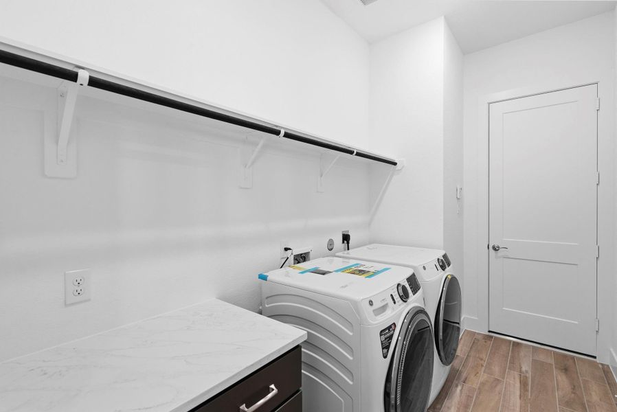 Furnished interior view inside a new home in Meridiana, Manvel (Image 4).