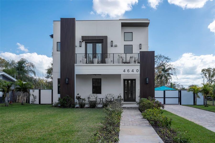 Front exterior of a new home in , St. Petersburg, FL, highlighting curb appeal (Image 25). Front exterior of a new home in , St. Petersburg, FL, highlighting curb appeal (Image 25).