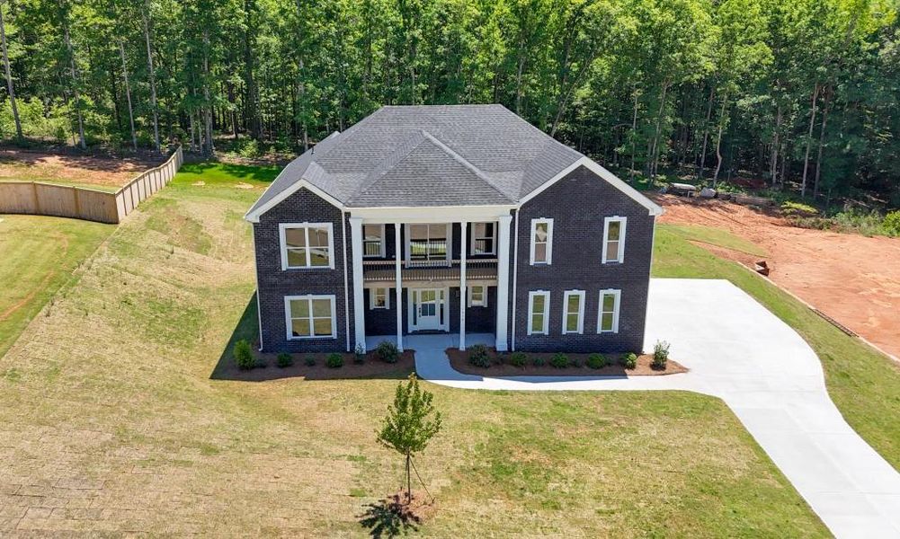 Front exterior of a new home in , Griffin, GA, highlighting curb appeal (Image 29).