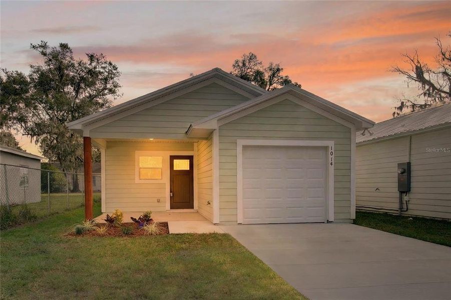 Front exterior of a new home in , Eustis, FL, highlighting curb appeal (Image 20). Front exterior of a new home in , Eustis, FL, highlighting curb appeal (Image 20).