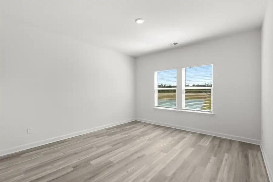 Spacious, unfurnished interior of a new home in Waterside - Boardwalk Series, Longs (Image 10).