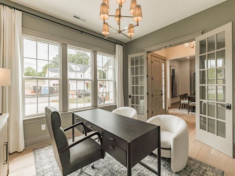 Representative furnished interior of a home built from the Garrison by JPOrleans in Coventry Glen, Huntersville (Image 16).