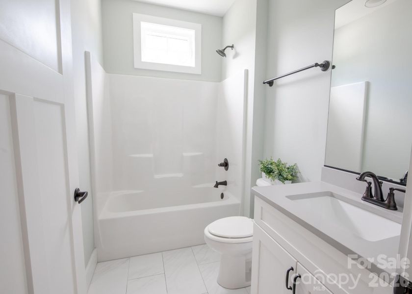 Furnished interior view inside a new home in , Hendersonville (Image 11).