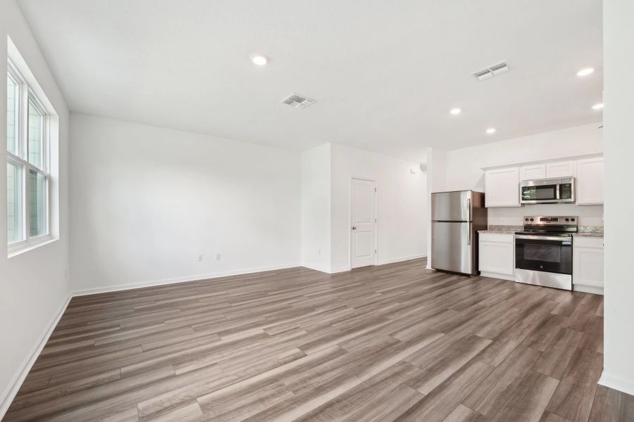 Representative unfurnished interior of a home built from the Nebula by Starlight Homes in Aster Towns, Summerville (Image 14).