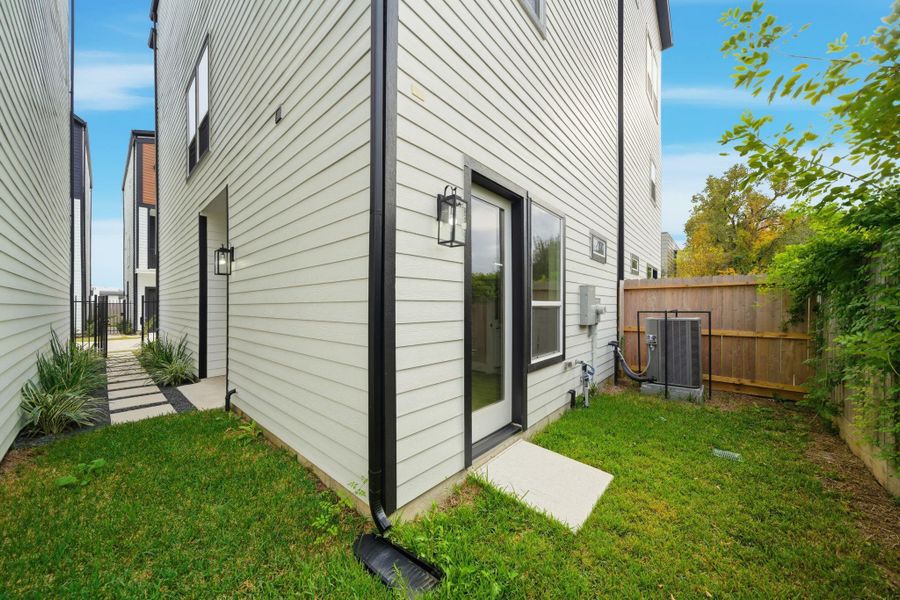 Exterior details and patio area of a home in , Houston (Image 3).