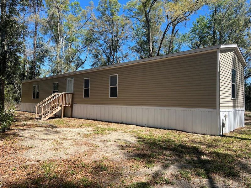 Exterior details and patio area of a home in , Branford (Image 20).