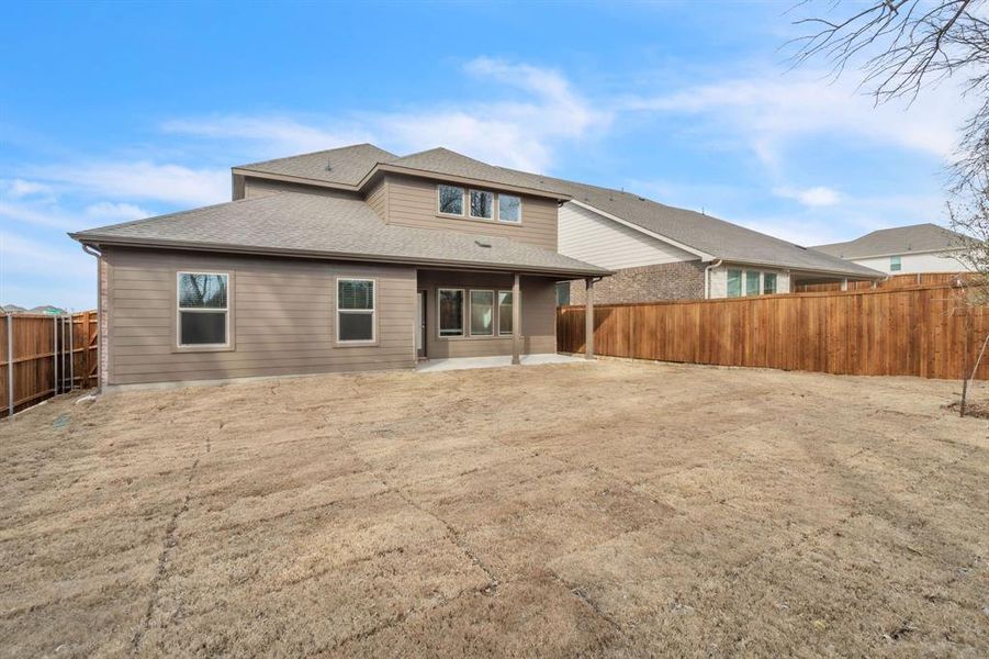 Exterior details and patio area of a home in The Landing at Hidden Lakes, McKinney (Image 4). Exterior details and patio area of a home in The Landing at Hidden Lakes, McKinney (Image 4).