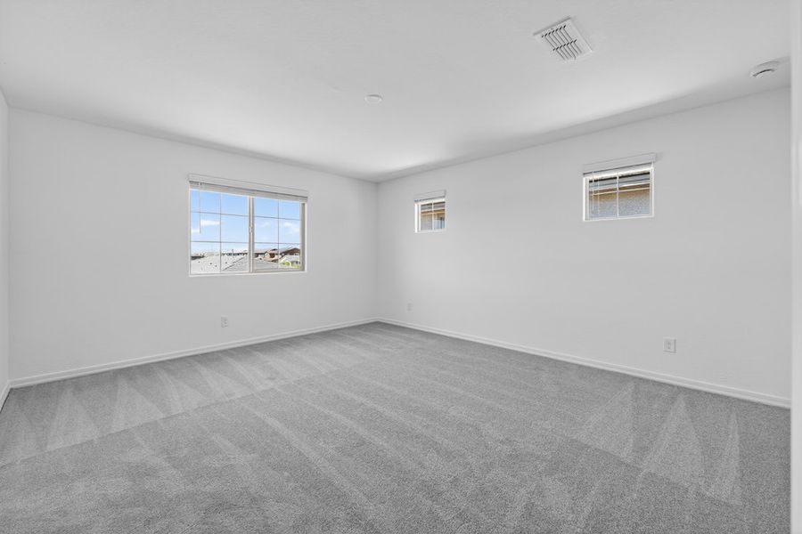 Spacious, unfurnished interior of a new home in La Mira, Mesa (Image 19). Spacious, unfurnished interior of a new home in La Mira, Mesa (Image 19).