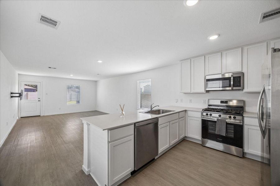 Beautiful kitchen that is open to the dinning and living room