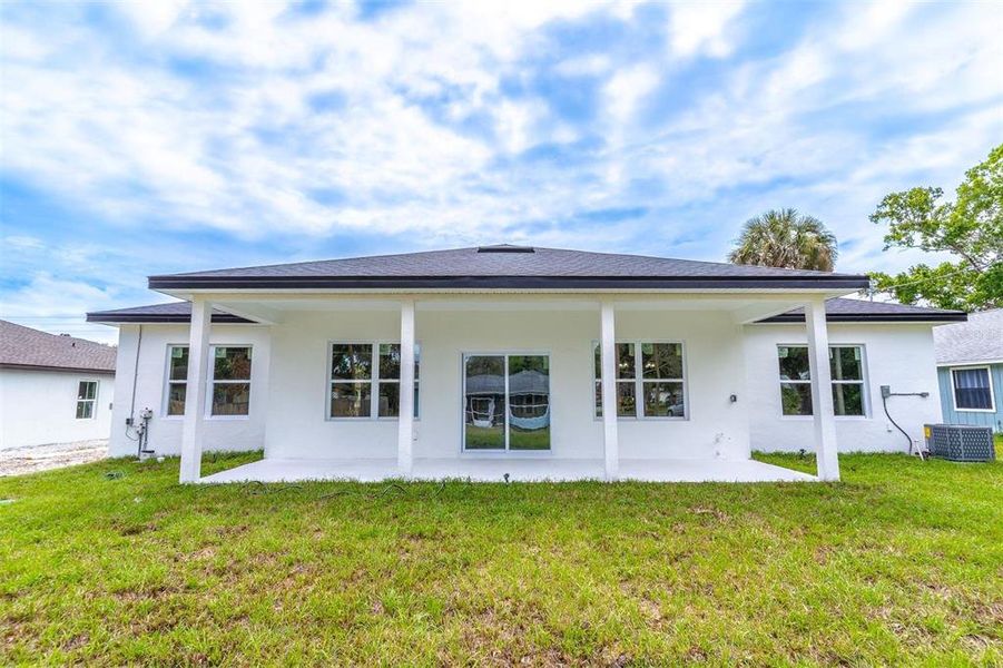 Exterior details and patio area of a home in , Palm Bay (Image 24).