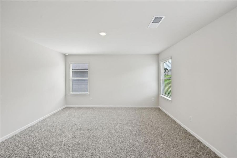 Spacious, unfurnished interior of a new home in Hawthorne Station, College Park (Image 21).
