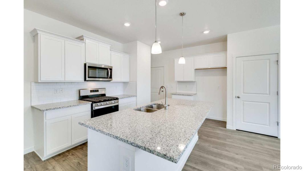 Furnished interior view inside a new home in The Ridge at Lorson Ranch, Colorado Springs (Image 4).