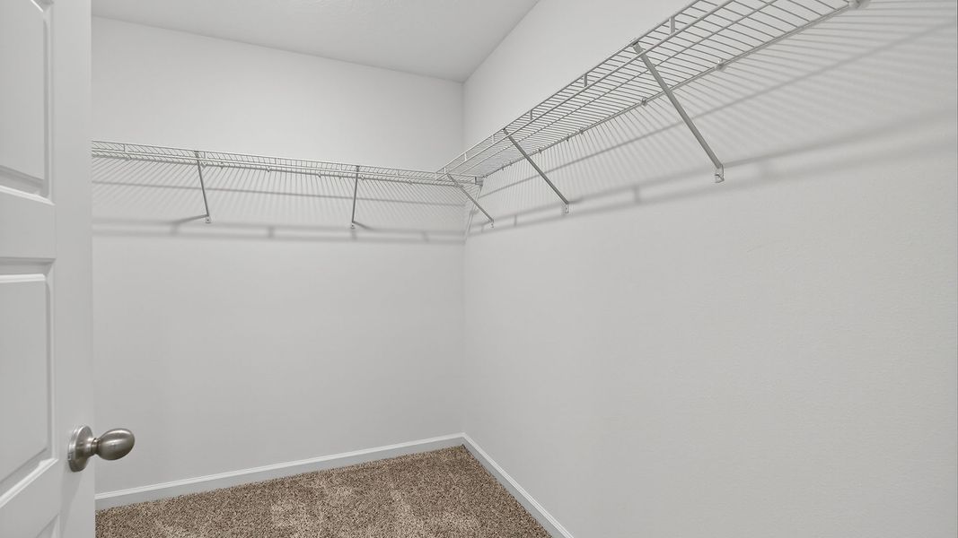 Representative unfurnished interior of a home built from the CALI by D.R. Horton in Sawmill Branch Express, Palm Coast (Image 23).