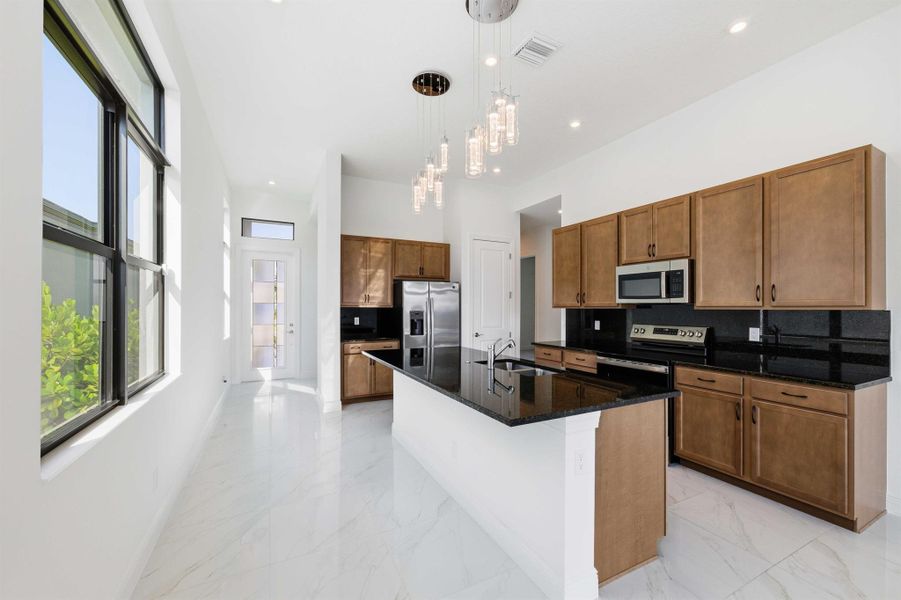Furnished interior view inside a new home in , Port St. Lucie (Image 10).