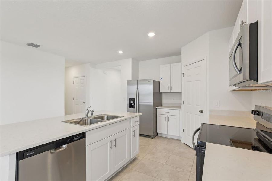 Furnished interior view inside a new home in Eden Hills, Lake Alfred (Image 4).