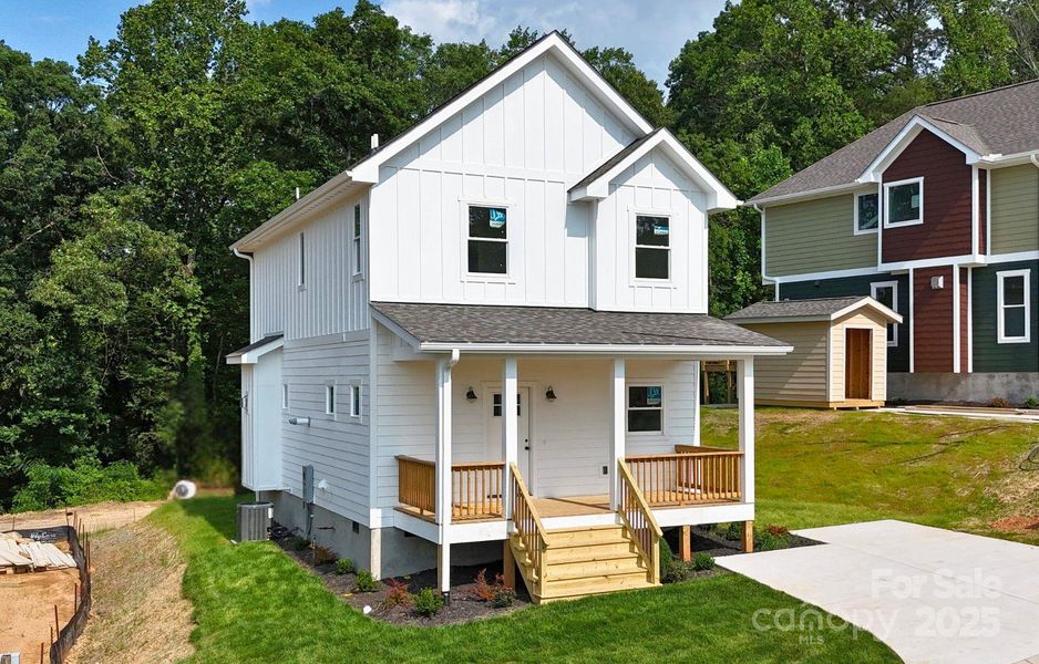 Front exterior of a new home in , Asheville, NC, highlighting curb appeal (Image 13).