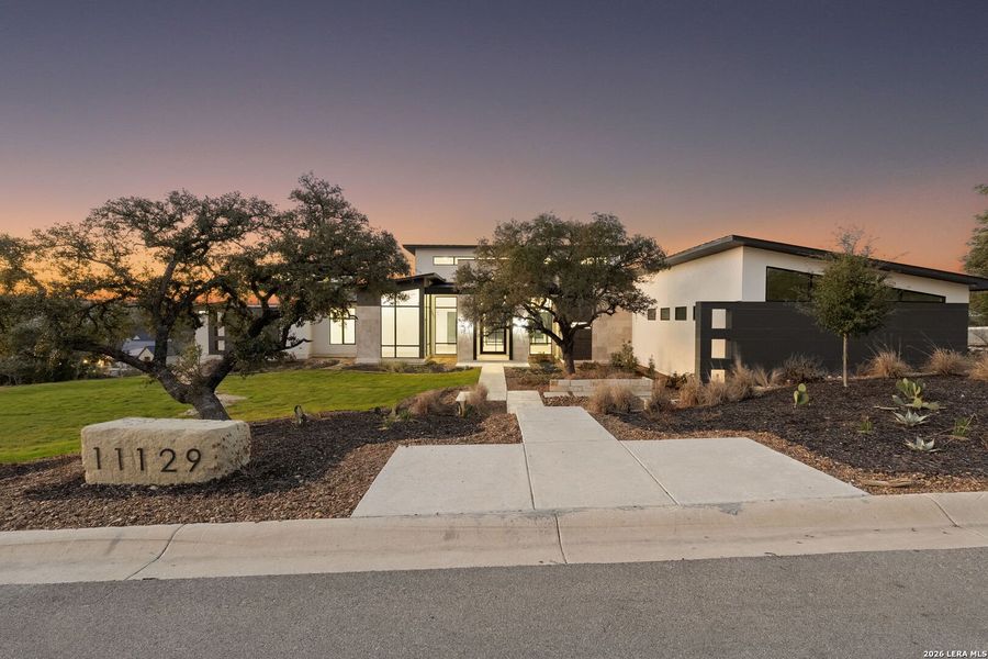 Front exterior of a new home in , Boerne, TX, highlighting curb appeal (Image 27).
