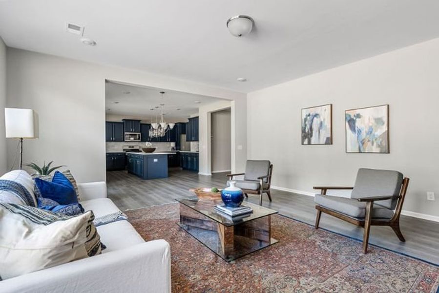 Representative furnished interior of a home built from the Winslow P by True Homes in Homecoming, Ravenel (Image 8).