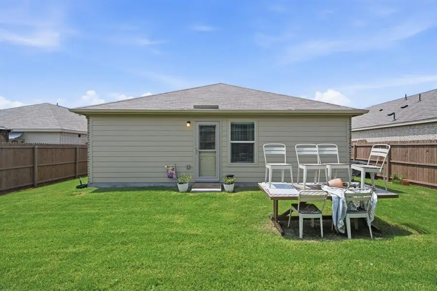Backyard ready for summer grilling and beautiful Texas sunsets of 1028 Naranjos Dr, Haslet TX in Rancho Canyon