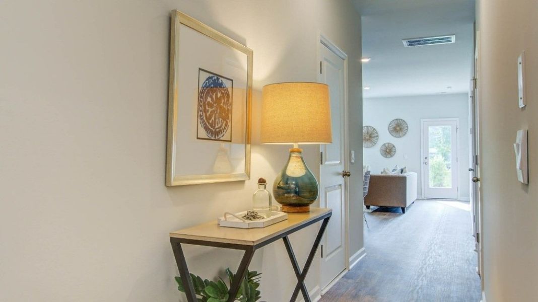 Representative furnished interior of a home built from the SULLIVAN by D.R. Horton in Settlement at Salamander, North Charleston (Image 5).