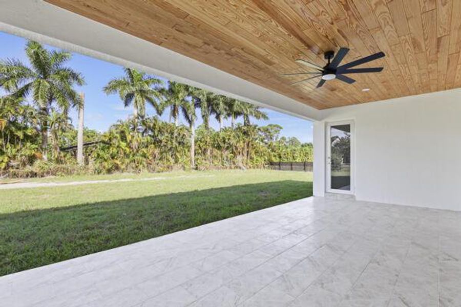 Exterior details and patio area of a home in , Loxahatchee (Image 30).