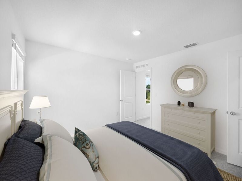 Representative furnished interior of a home built from the Azalea by Taylor Morrison in Palm Wind, Hudson (Image 16).