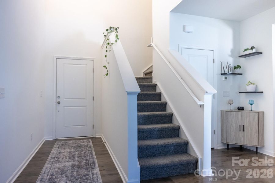 Entryway and stairwell upstairs Entryway and stairwell upstairs