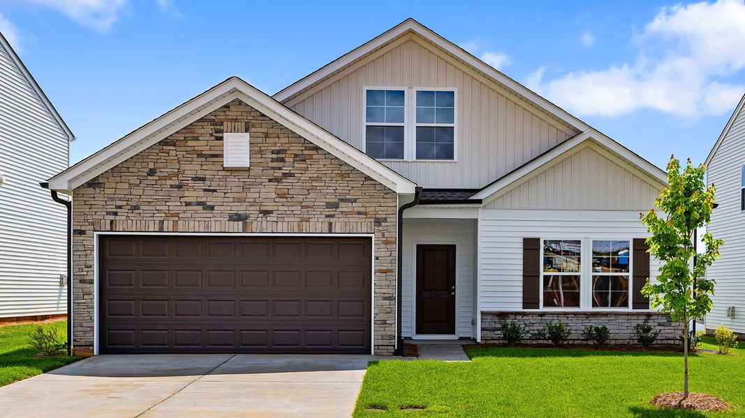 Front exterior of a new home in Hanes Lake, Winston-Salem, NC, highlighting curb appeal (Image 1).