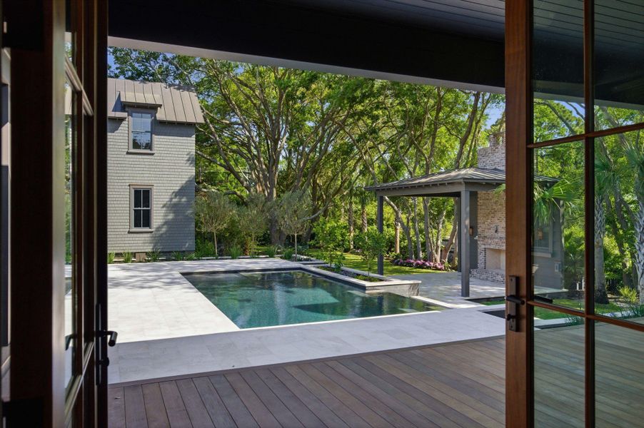 Exterior details and patio area of a home in , Sullivan's Island (Image 25).
