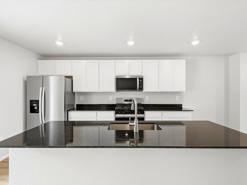 Furnished interior view inside a new home in Three Hills, Morrison (Image 4).
