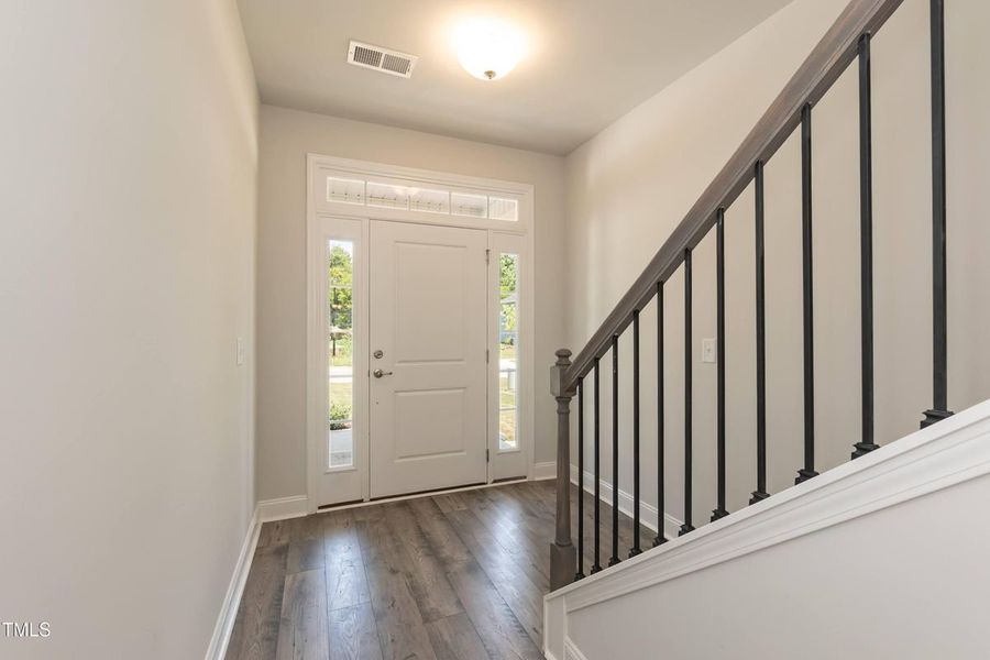 Representative unfurnished interior of a home built from the 2709 by Adams Homes in The Grove at Ballard, Jacksonville (Image 16).