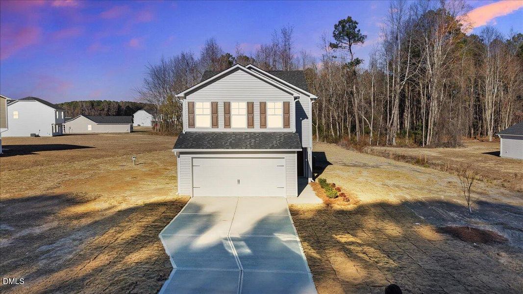 17-Front exterior of home at dusk