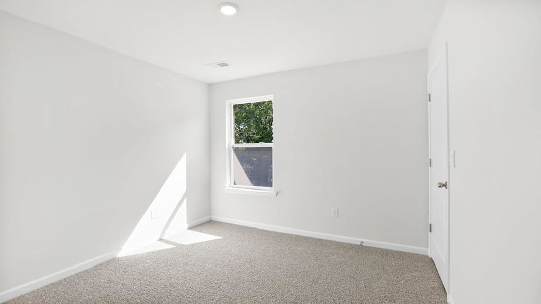 Spacious, unfurnished interior of a new home in Varner Station, Woodruff (Image 23).