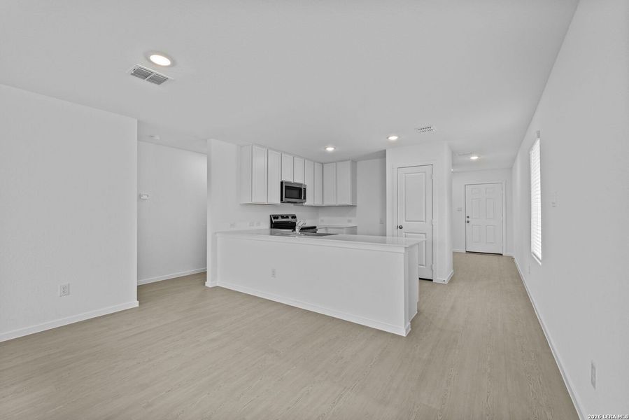 Spacious, unfurnished interior of a new home in Hidden Oasis, San Antonio (Image 19). Spacious, unfurnished interior of a new home in Hidden Oasis, San Antonio (Image 19).